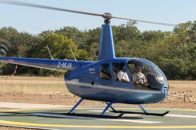 13-15 minutes Private Short Helicopter Flight - The Guide and Ground Service