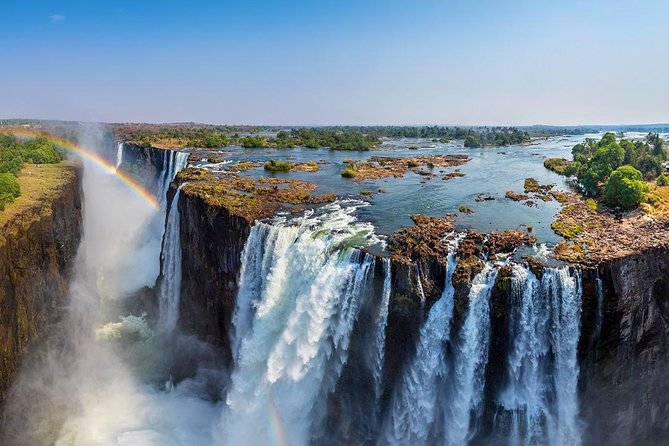 Full Day Victoria Falls incl lunch & Devils Pool 10h ZIMBABWEAN & ZAMBIAN SIDE - Three hours among the Zimbabwe rainforest viewpoints
