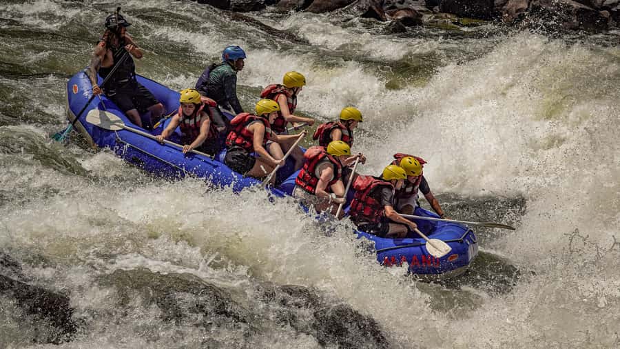 Full Day White Water Rafting Tour - Lunch, photographs, and the last climb