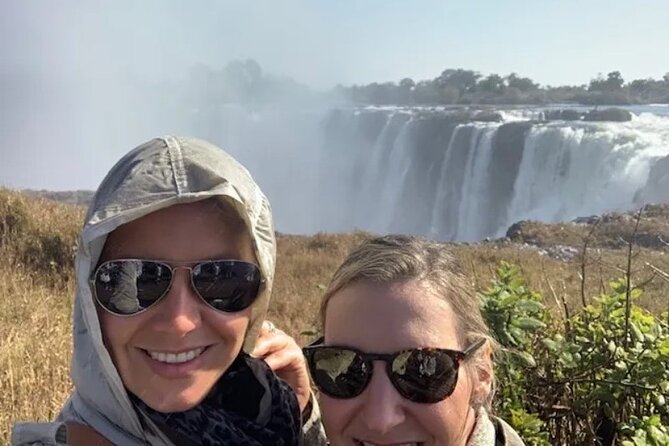 Guided Falls Tour & Zambezi River Cruise Combo - The old baobab, Livingstone, and the bridge
