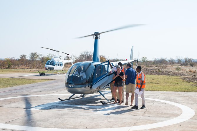Helicopter Scenic Flight over Victoria Falls 12-13 minutes Flight - Bubble windows, photography, and rainbows