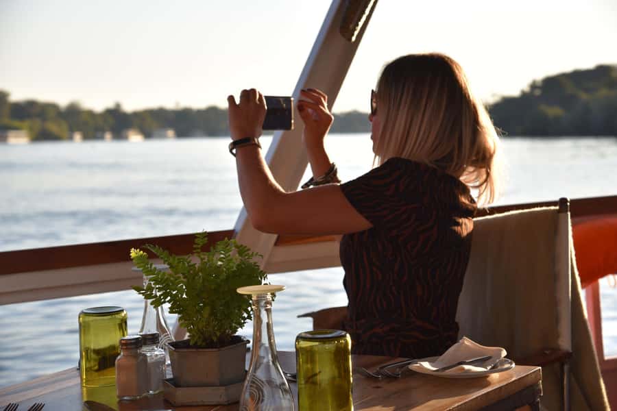 Luxury Sunset Dinner Cruise with 4-Course Meal - Cruising upstream among islands and riverbanks