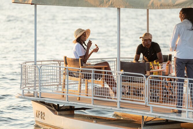 Private Sunset Cruise on the Zambezi River - Watching Victoria Falls mist rise from the river