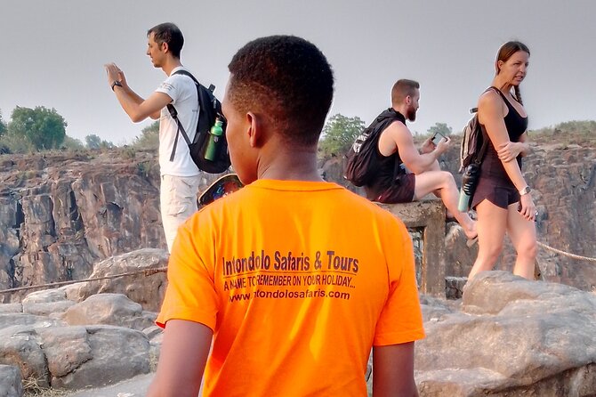 Victoria Falls Airport Pvt Transfers, Sundowner Cruise & Tour of the Falls Combo - Sunset drinks, snacks, and possible elephants