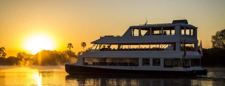 Victoria Falls and Zimbabwe: Scenic day Tour & Sunset Cruise - Starting with Victoria Falls in the rainforest