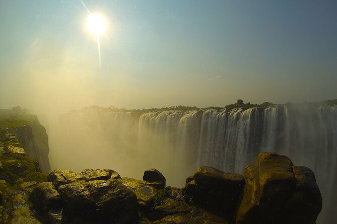 Victoria Falls Guided Tour - Rainbows, mist, and changing photo conditions