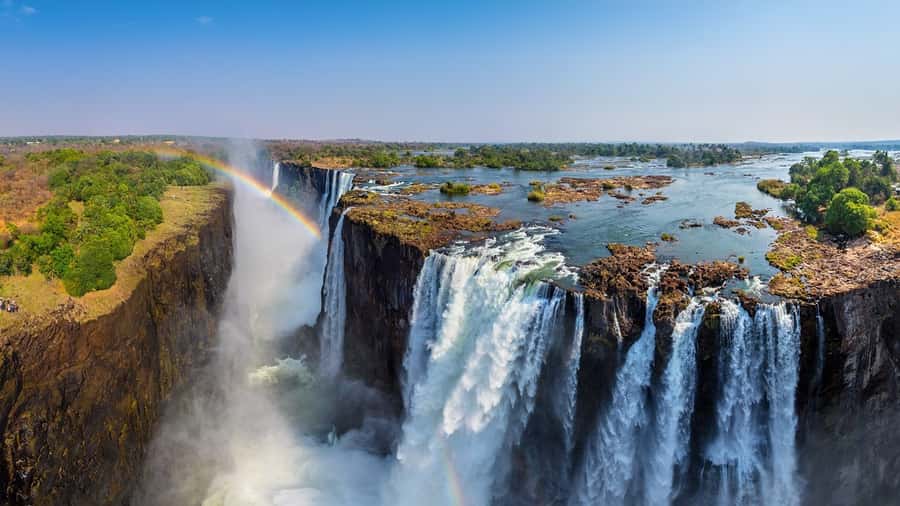 Victoria Falls Town: Victoria Falls Guided Sunrise Tour - Entering Victoria Falls before the crowds