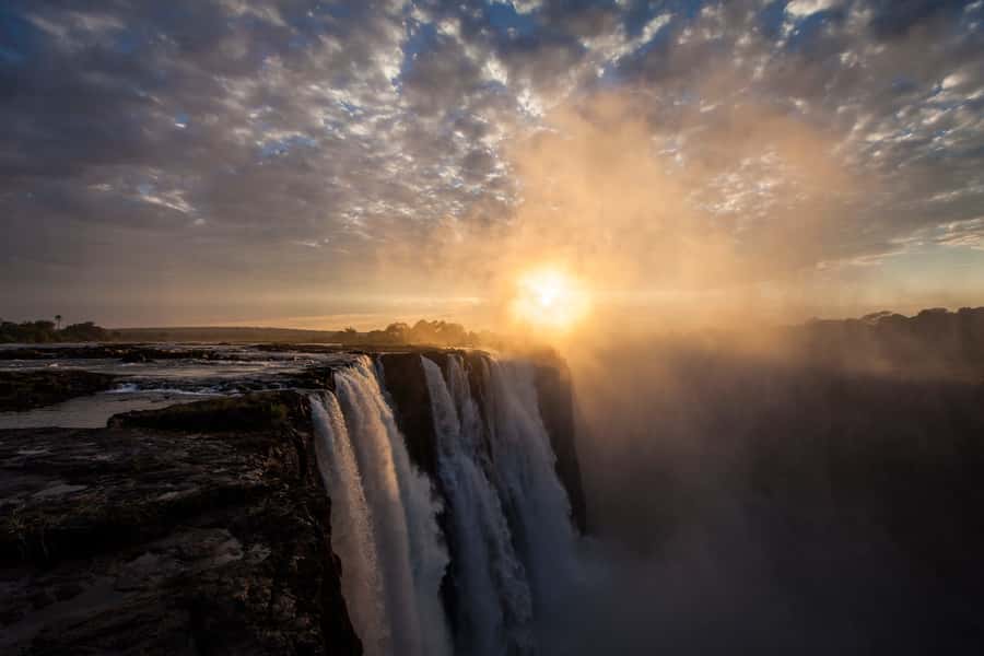 Victoria Falls Town: Victoria Falls Guided Sunrise Tour - Hotel pickup and the short ride to the park