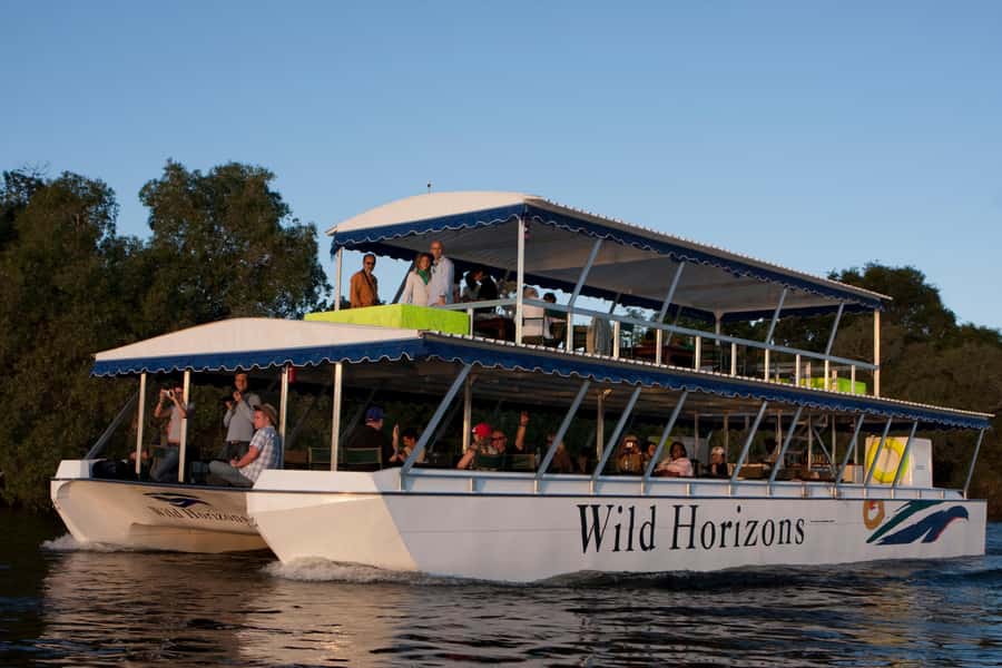 Zimbabwe: Sundowner Cruise (Standard) Zambezi River - Boarding the boat and settling into the Zambezi